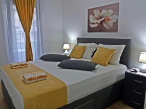 R APARTMENTS